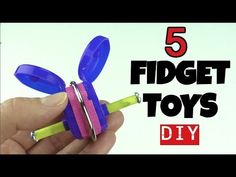 a hand holding a small toy in it's palm with the text 5 fidget toys diy