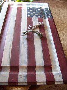 an american flag painted on top of a table