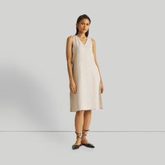 Introducing our ' V-Neck Straight Dress' - an epitome of effortless elegance and minimalist chic. This midi-dress embodies modern sophistication with its clean lines and contemporary cut, embracing the essence of simplicity. Designed for versatility, it's a summer essential, perfect for various occasions. Its A-line fit offers comfort and style, while the V-neck and in-cut sleeves add a touch of allure. This stylish dress is complemented by functional pockets on both sides for practicality. Wash Straight Midi Dress, Fitted Knee Length Dress, Hemp Dress, Drawstring Dresses, Minimalist Chic, Bandeau Dress, Summer Essential, Straight Dress, Tiered Maxi Dress