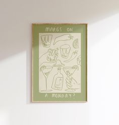 a green and white poster hanging on the wall