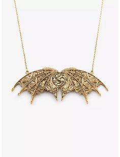 When you build your house on Fire and Blood, you have no concerns about subtlety, and this epic double-hung necklace is anything but subtle! With complex detailed artwork recessed into brass wings adorning the already fearsome Targaryen sigil, this beastly jewelry piece measures 10cm (3.94") across and is hung on an 18" matching brass chain with a 2" extender and lobster clasp. House Of The Dragon Targaryen, Dragon Shirts, Targaryen Sigil, House On Fire, Fire And Blood, Build Your House, Dark Jewelry, Retro Skirt, Her Universe