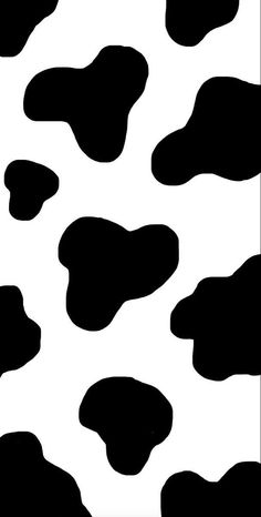 a black and white cow pattern with spots on it's skin is seen in this image