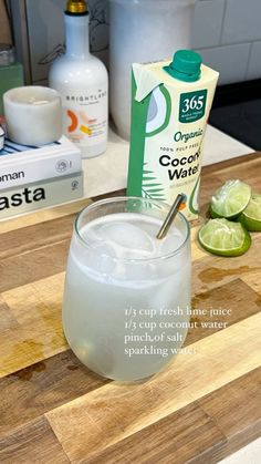 the ingredients to make this drink are displayed on a cutting board