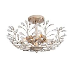 a ceiling light with clear glass flowers and leaves on the bottom, against a white background