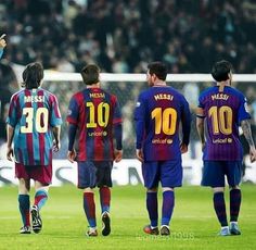 a group of men standing on top of a soccer field