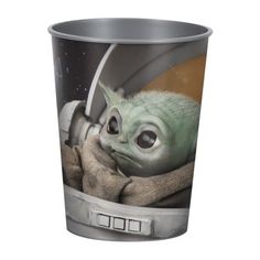 the child yoda from star wars is shown in this plastic cup, which features an image of baby yoda