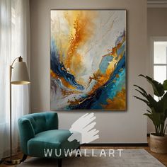 an abstract painting hangs on the wall above a blue chair in front of a window