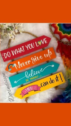 four wooden signs that say do what you love, never give up, believe and can do it