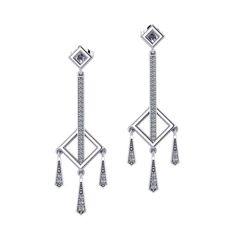 These Diamond Square Dangle Earrings are inspired with geometric details. Classic Dangle Diamond Earrings For Evening, Classic Evening Dangle Diamond Earrings, Timeless Diamond Dangle Linear Earrings, Classic Long Drop White Gold Diamond Earrings, Diamond Drop Earrings In Fine Jewelry Style, Fine Jewelry Dangle Earrings With Single Cut Diamonds, Diamond Dangle Earrings With Prong Setting, Luxury Drop Earrings With Single Cut Diamonds, Diamond White Earrings With Single Cut Diamonds For Evening