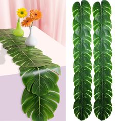 PRICES MAY VARY. Polyester - Unique Design: Our Artificial Palm Leaves Table Runners 72 Inch are meticulously crafted to resemble real palm leaves, providing an authentic tropical ambiance for weddings, Hawaiian luaus, jungle-themed parties, tropical baby showers, and summer table decorations. - Complete Set: Each package includes 2 exquisite artificial palm leaves table runners that are interconnected to create a seamless and visually stunning table setting. With these runners, you can effortlessly achieve the perfect tropical look for your event. - High-Quality Material: Made from premium polyester material, our tropical table runners are soft, durable, and easy to maintain. They mimic the appearance of real palm leaves, offering a beautiful tropical aesthetic without the hassle of carin Palm Leaf Centerpiece Baby Shower, Palm Trees Baby Shower Theme, Louisiana Alligator Themed Table Centerpieces, Louisiana Theme Table Centerpiece, Jungle Party Table Set Up, Baby Shower Safari Table Setting, Simple Tropical Centerpieces Baby Shower, Safari Theme Table Runner, Safari Baby Shower Table Settings