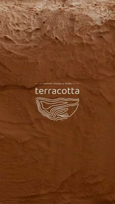 the terracotta logo is shown on a brown background