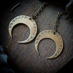 "Brass crescent moon earrings, French artisanal jewelry. Wear jewelry with moons to represent freedom and feminine power. The crescent, symbolizing the re-birth or regeneration aspect of the moon, is the symbol of feminine power and the nature of women. The crescent moon represents the transition from darkness (of the new moon) to light (of the full moon). >>-> DESCRIPTION: The earrings represent crescent moons that I made from a brass plate using traditional jewelry techniques. The entire proce Symbolic Nickel-free Crescent Jewelry, Handmade Celestial Earrings For Festivals, Bohemian Moon Shaped Brass Jewelry, Bronze Moon-shaped Brass Jewelry, Brass Moon Shaped Festival Earrings, Moon Phase Brass Earrings For Festival, Unique Moon-shaped Brass Jewelry, Moon-shaped Brass Earrings For Festival, Handmade Crescent Celestial Earrings