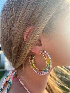 Rainbow and white bugle and heishi beads handmade together to create the ultimate summer fringe hoop earrings. 2.30 " in diameter 10k gold plated Summer Fringe, Fringe Hoop Earrings, Beads Handmade, Heishi Beads, Earrings White, Beaded Fringe, Bracelet Stack, 10k Gold, White Out