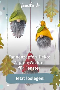 two gnomes are hanging from the ceiling with leaves on them, and one is wearing a hat