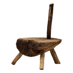 a wooden chair made out of logs