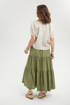 Are you looking for an easy, comfortable skirt? With tiered layers for movement and a flattering a-line cut, our Resort Skirt is your slip-on-and-go style for year-round wear. Style it for all seasons -- pairing it with a linen top in summer or adding a boot and a light jacket layer - you'll have a fall look. Maxi length Pockets Elastic waistband with drawstring tie Material: 100% Indian Cotton Care: Machine wash, hang to dry, or tumble dry low Studio model is 5'8" and is wearing a Small Versatile Flowy Tiered Maxi Skirt, Tiered Maxi Skirt For Layering, Versatile Relaxed Tiered Maxi Skirt, Relaxed Tiered Maxi Skirt With Layered Hem, Versatile Gathered Maxi Skirt For Spring, Relaxed Tiered Maxi Skirt, Versatile Tiered Maxi Skirt, Casual Flowy Tiered Maxi Skirt, Versatile Tiered Lined Skirt