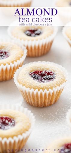 small cupcakes with jam on them sitting on a white surface and text overlay reads almond tea cakes