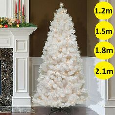 a white christmas tree is shown in front of a fireplace with measurements for the height