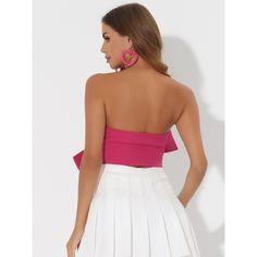 Women's cropped bandeau top with sleeveless, a front large bow, and a sweetheart neck design, is a perfect choice for a boldly feminine and stylish look. The sweetheart neckline accentuates your curves, while the strapless design adds a touch of charm. The bow detail on the front adds a playful element to the overall aesthetic. Whether you're heading to a party or a night out on the town, these crop tops are sure to turn heads. Trendy and cute style, the bow tie strapless crop top paired with sk Flirty Bandeau Tube Top For Date Night, Strapless Crop Top For Summer Date Night, Strapless Crop Top For Date Night In Summer, Summer Party Tops With Bow Tie Back, Strapless Crop Top For Date Night In Spring, Glamorous Bandeau Crop Top For Summer, Flirty Sweetheart Neckline Crop Top For Party, Strapless Flirty Crop Top For Party, Flirty Crop Top With Sweetheart Neckline For Party