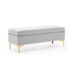 a grey bench with gold legs on a white background