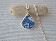 Scottish blue sea pottery sterling silver necklace. This lovely piece of sea pottery was collected by me on a Scottish beach. It is top drilled and fitted with sterling silver bail to an 18 inch sterling silver chain. Please let me know if you would like a different chain length - I'd be happy to arrange it at no extra cost. I pour my heart into the jewellery I make and I hope you will treasure it as much as I treasure creating it. This necklace is packaged in a white organza bag and tissue pape Pottery Jewellery, Pottery Necklace, Scottish Beach, Jewellery Unique, Sea Pottery, Scottish Gifts, Necklace Blue, Necklace Sterling Silver, Organza Bags