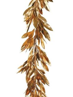 some gold leaves are hanging from a branch