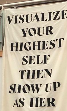 a banner that says visualize your highest self, then show up as her own