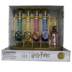 a harry potter display case with hogwart's houses and crests on it