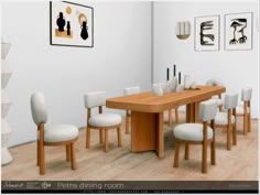 a wooden table surrounded by white chairs in a room with pictures on the wall behind it