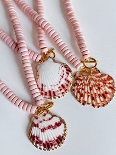 Our Island Time Shell Beaded Necklace in Soft Pink is the perfect necklace for the beach lover. This necklace features ivory beads, real sea shell with gold plated edges, and lightweight for layering. Style this necklace with your favorite summer dress, your next beach trip with your fave bikini, or with your fave graphic tee! Please be gentle with your shell ♡ All accessories are final sale. Natural Shell Necklace, Beach Projects, Shell Beaded Necklace, Sea Style, Shell Ideas, Layering Style, Shell Beads Necklace, Beach Lover, Coastal Cowgirl