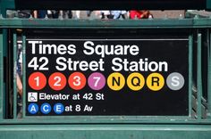 the times square subway station sign in new york city, ny stock photos and images