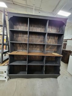 an empty bookcase in a storage room