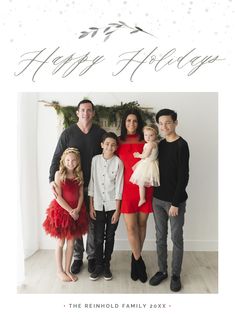 a family posing for a christmas card with the words merry and happy new year on it