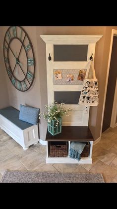 a living room with a clock on the wall next to a bench and storage area