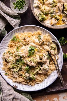 a plate of chicken and broccoli casserole next to two bowls of rice