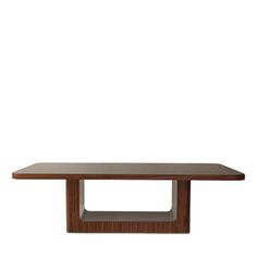 a wooden table with a square shaped shelf on the top, against a white background