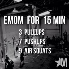 an empty gym with the words emom for 15 min 3 pullups 7 push ups 9 air squats