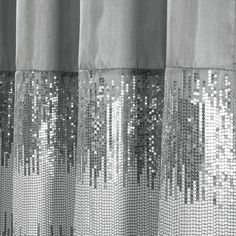 black and white photograph of curtains with sequins