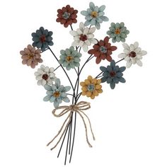 a bunch of flowers that are tied up to a string on a white background with a bow