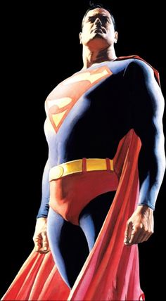 a man in a superman costume standing with his hands on his hips and looking up