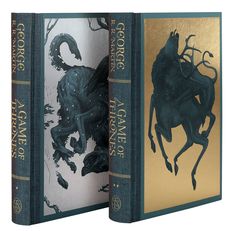 two books with gold and blue covers on each cover, one has a black horse