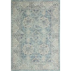 a blue and white rug with an ornate design