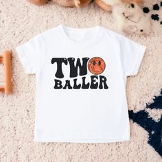 Basketball Birthday Shirt, Second Birthday Shirt, Boy Birthday Shirt, Basketball Birthday, Birthday Boy Shirt, Toddler Birthday Shirt 💗  Welcome to The WildflowerbyMiley Etsy Shop!  This listing is for the bodysuit, sweatshirt or t-shirt only. All other items that are shown in our photos such as shoes, hats, beanies, blankets etc. are for photo staging purposes and are NOT INCLUDED in the sale. DESCRIPTION:  This baby and children's unisex essential fits like a well-loved favorite. Super soft t Second Birthday Shirt, Boy Birthday Shirt, Birthday Boy Shirt, 2nd Birthday Shirt, Basketball Birthday, Birthday Boy Shirts, Wichita Ks, Boy Shirt, Birthday Themes