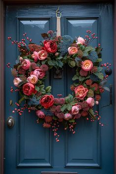 a blue door with a wreath on it