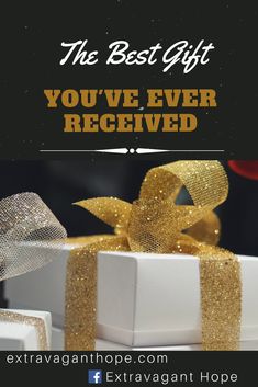 the best gift you've ever received is a white present box with gold ribbon