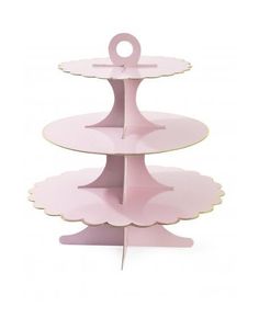 three tiered cake stand in pink with scalloped edges and an o - ring on the top