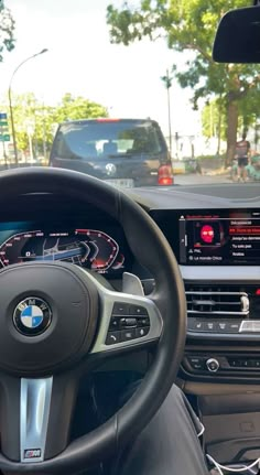 the interior of a car with an electronic dashboard