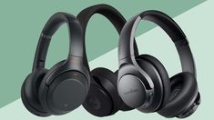 three wireless headphones on a green background