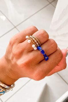 Some of our favorite rings all stacked on one hand! Stackable Open Ring Jewelry For Promise, Unique Stackable Promise Jewelry, Unique Pearl Promise Ring, Fine Jewelry Stackable Pearl Promise Ring, Blue Stackable Open Ring, Fine Jewelry Blue Lapis Lazuli Ring, Classic Lapis Lazuli Jewelry Ring, Blue Lapis Lazuli Rings Fine Jewelry, Luxury Cabochon Lapis Lazuli Rings