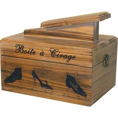 a wooden box with shoes on it and the words boots at george written in black